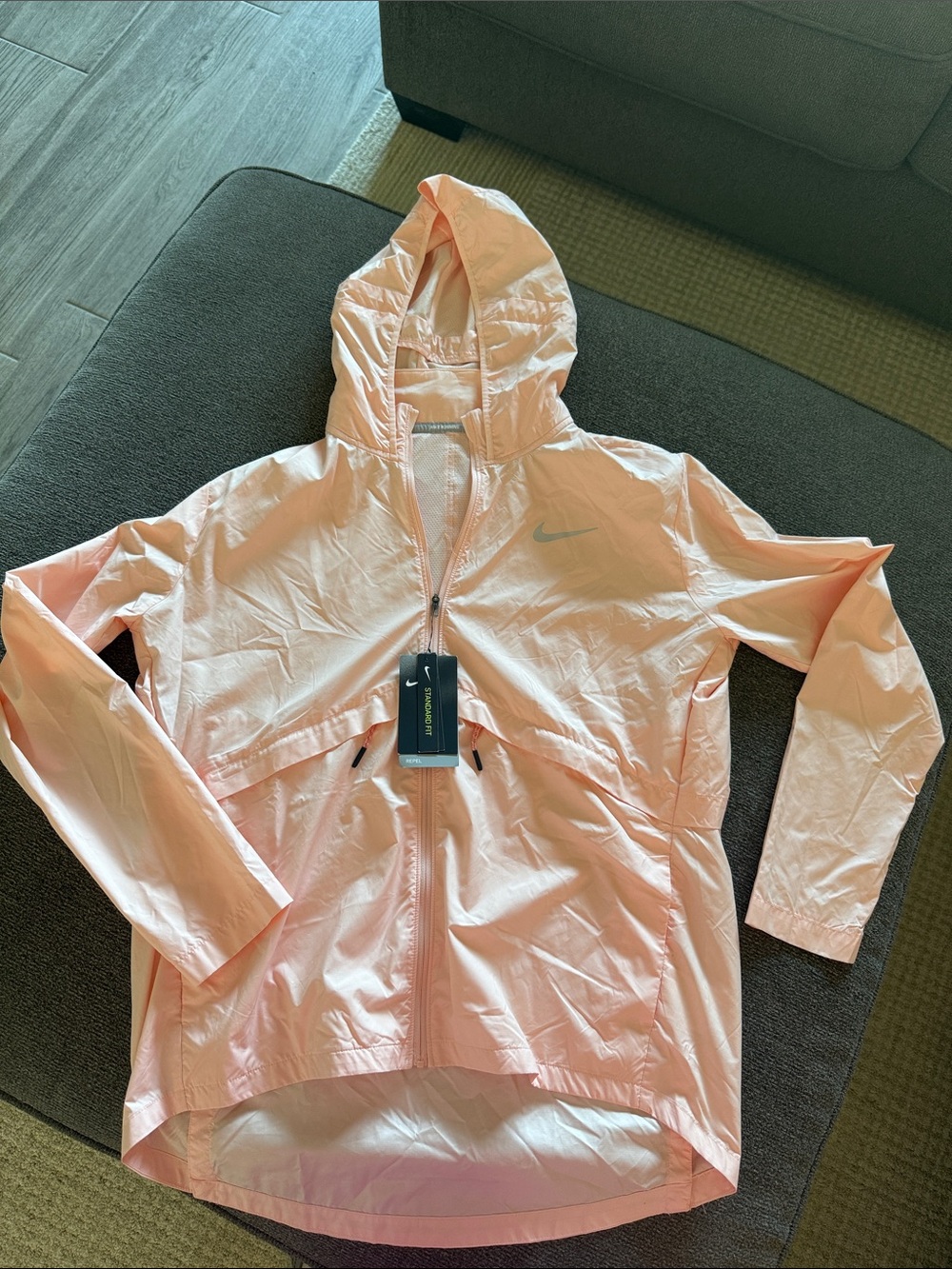 Nike Women’s Light Peach Hooded Windbreaker Jacket